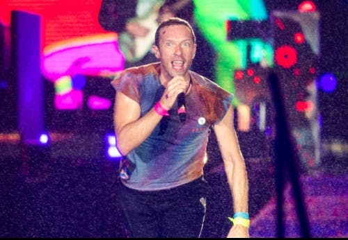 Coldplay lava a alma com muitas luzes e música em português no Rock in Rio