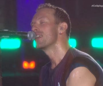 Coldplay lava a alma com muitas luzes e música em português no Rock in Rio